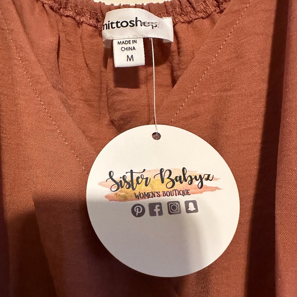 Jumper, wide legs,pockets. Brand new with tags.